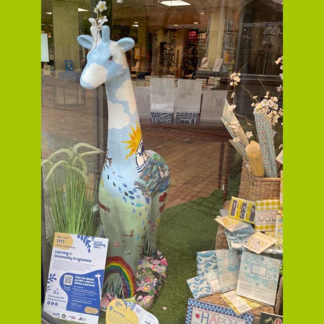 Our giraffe looking magnificent in the window of Heffers 👏